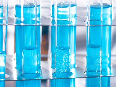 test tubes full of a blue liquid