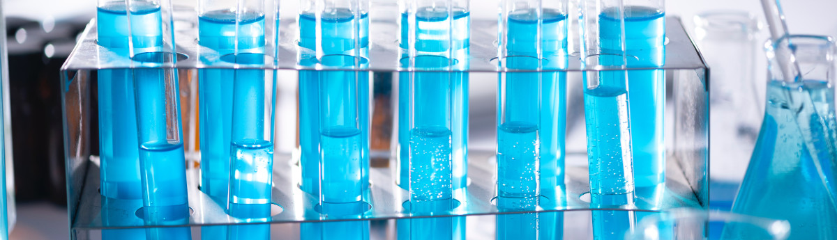 test tubes full of a blue liquid
