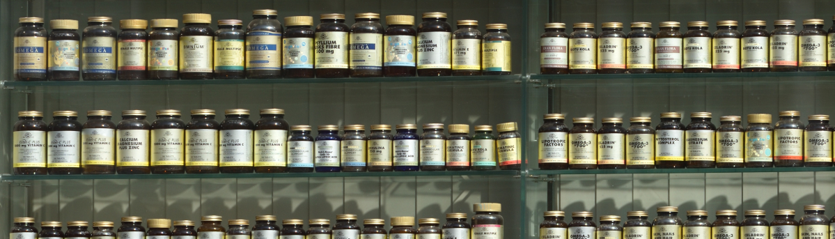 bottles of vitamins and supplements on shelves